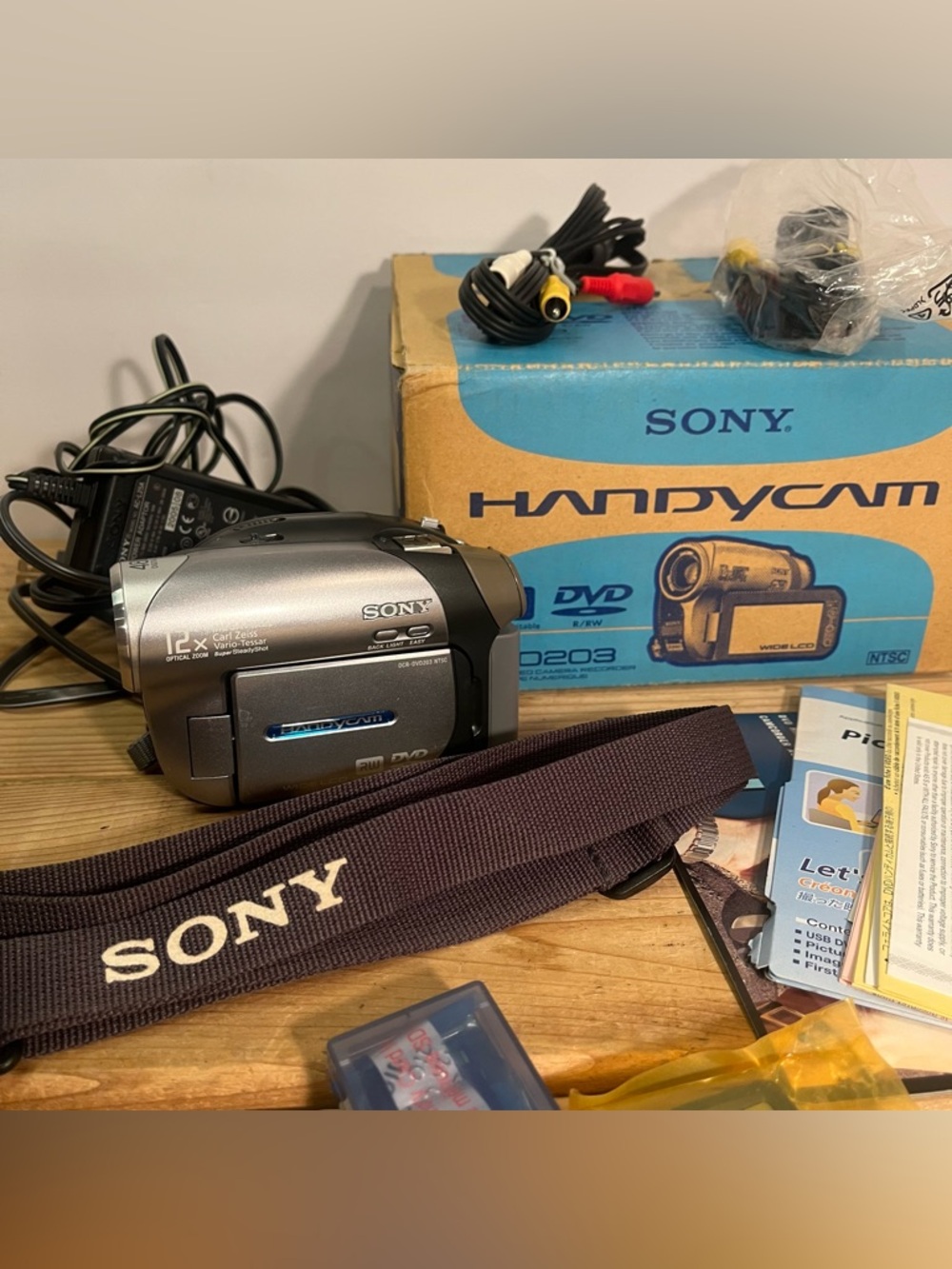 Sony Handycam DCR-DVD203 DVD Camcorder, W/ Box, Cords, Books, Sd Card, Strap